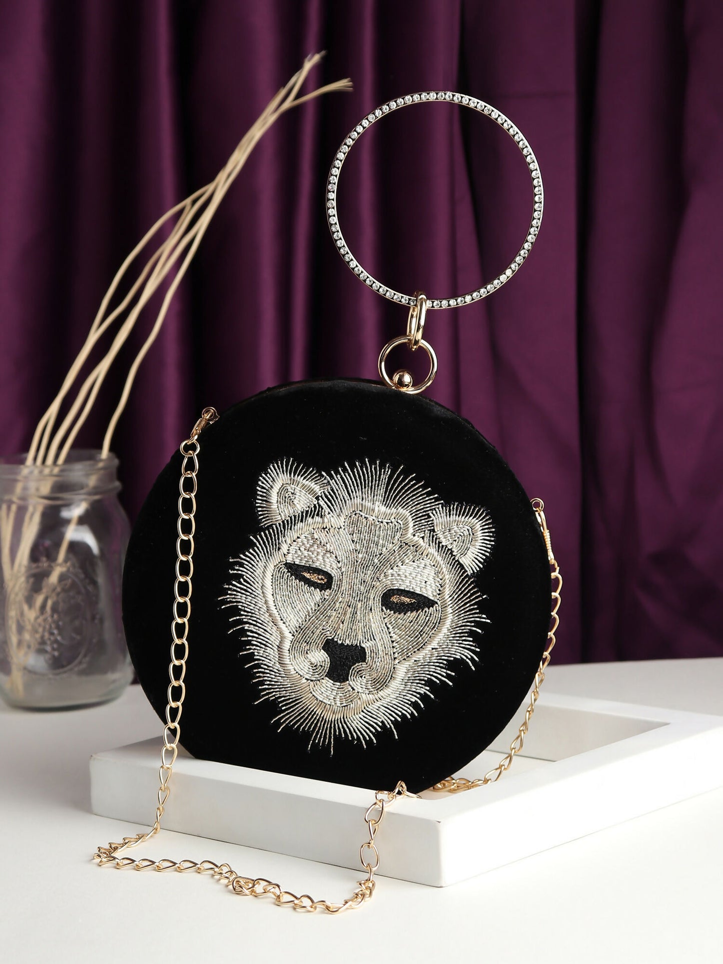 Tiger's Eye Round Black Clutch