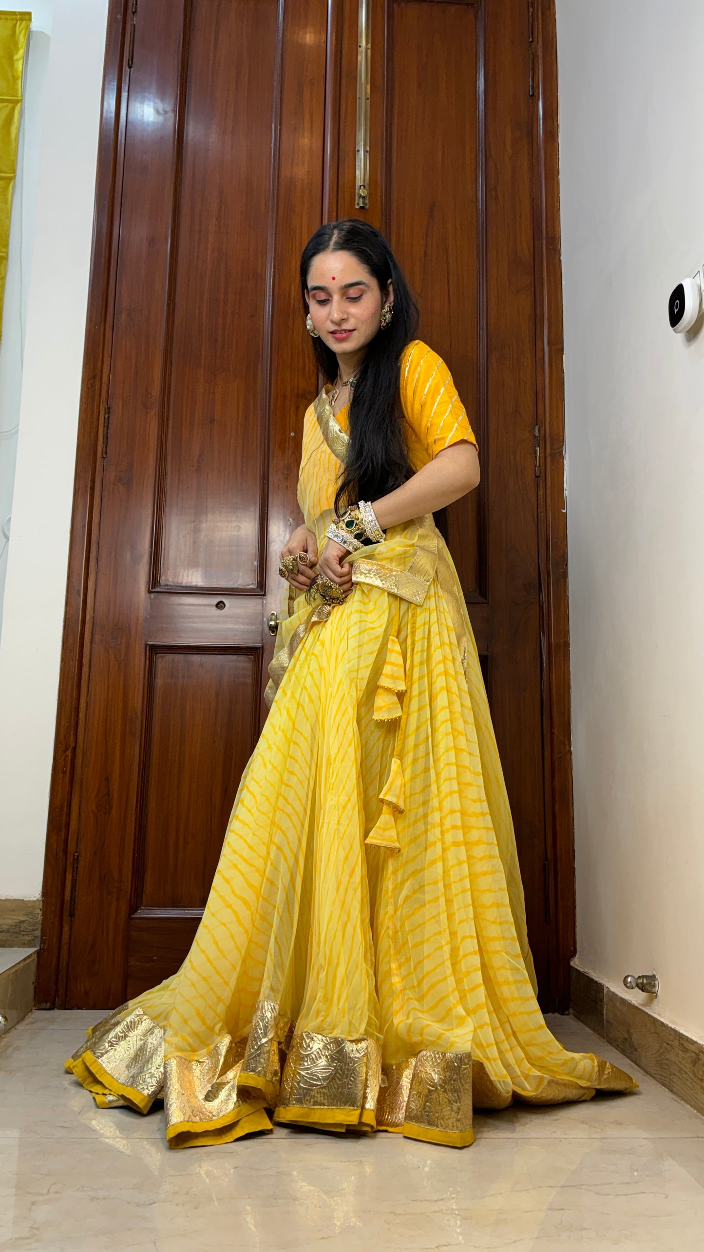 Pavitra Yellow Leheriya Lehenga