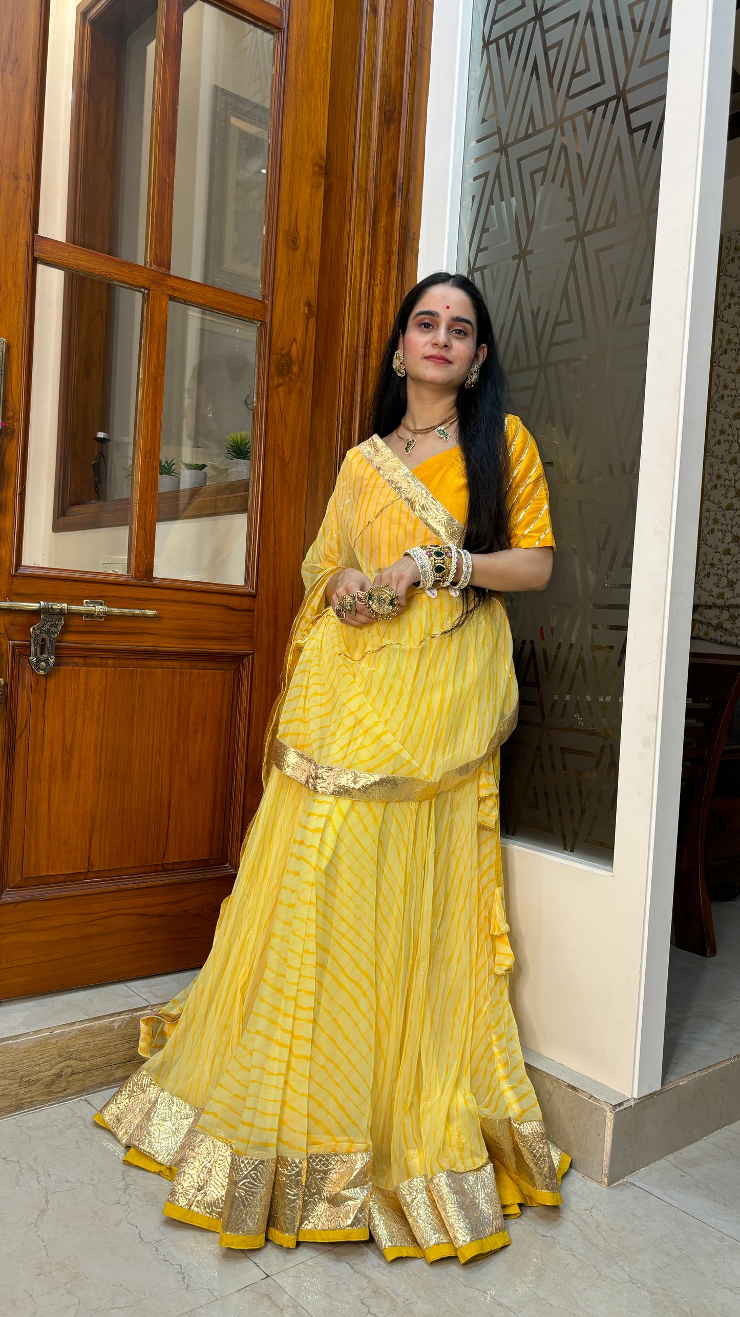 Pavitra Yellow Leheriya Lehenga