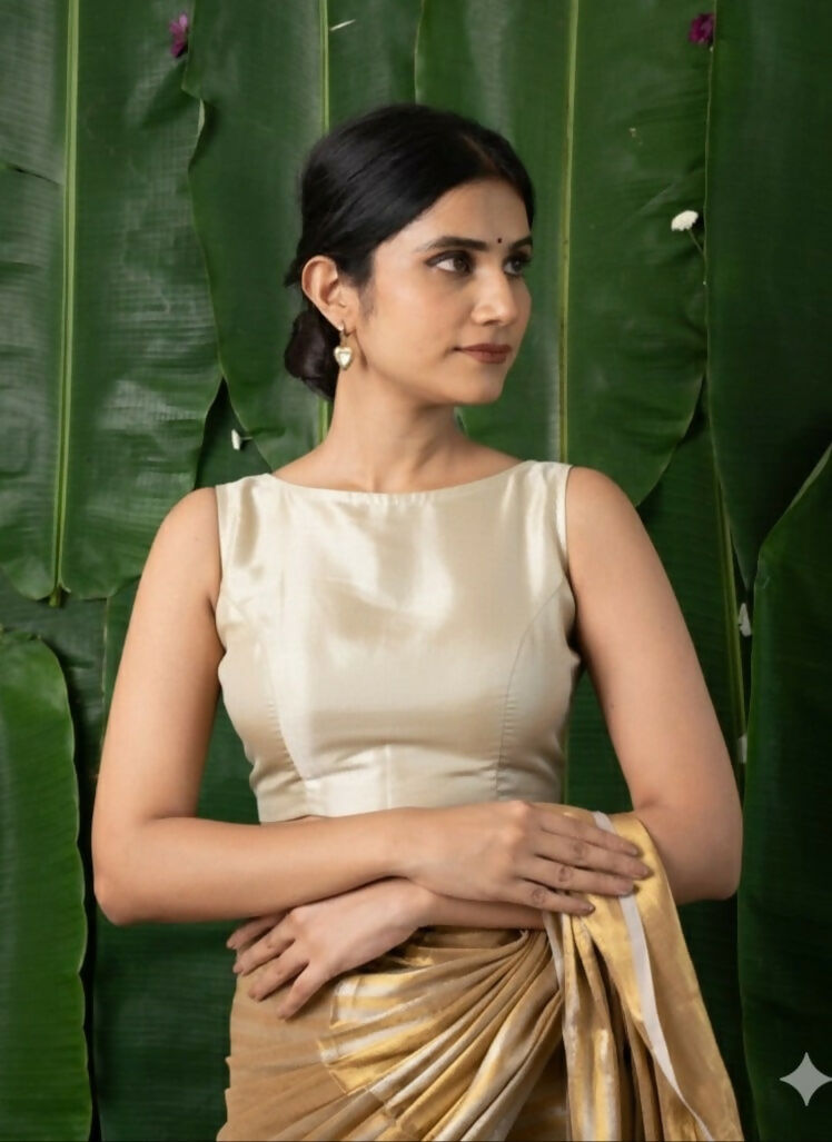 Navya Golden Tissue Sleeveless Back Open Blouse