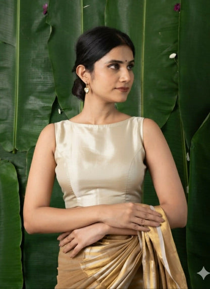 Navya Golden Tissue Sleeveless Back Open Blouse