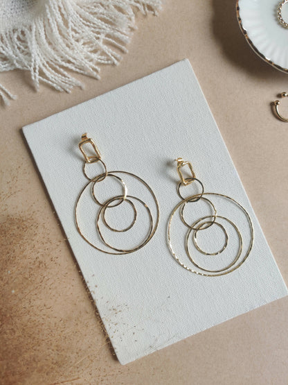 Entangled Brass Hoops